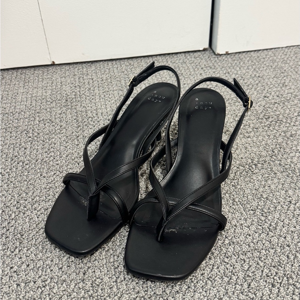 Black target kitten heels